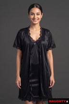 Naughty black silky satin 2-piece lingerie set with lace-trimmed nightdress and matching robe on a smiling model